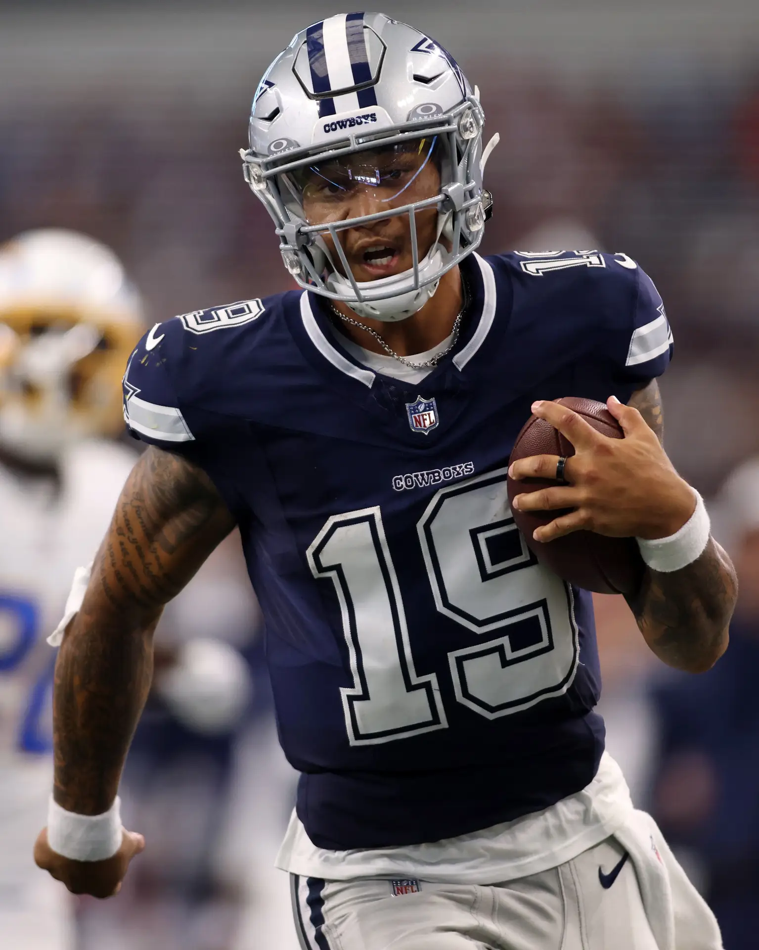 Aug 24, 2024; Arlington, Texas, USA; Dallas Cowboys quarterback Trey Lance (19) runs for a touchdown against the Los Angeles Chargers in the third quarter at AT&T Stadium. Mandatory Credit: Tim Heitman-Imagn Images