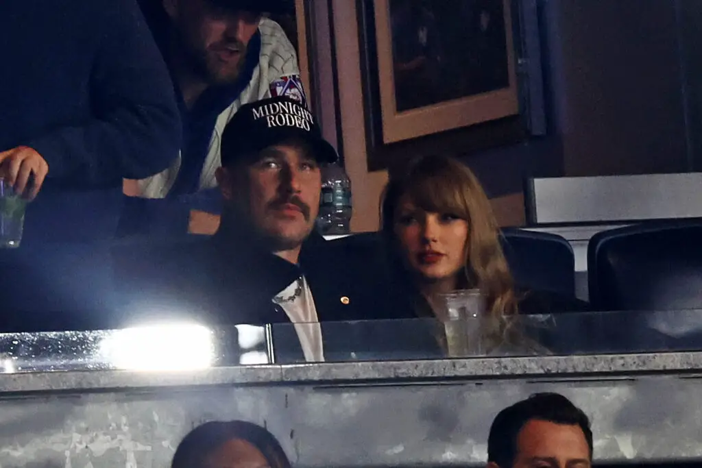 Oct 14, 2024; Bronx, New York, USA; Recording artist Taylor Swift and Kansas City Chiefs tight end Travis Kelce watch game one of the ALCS for the 2024 MLB Playoffs between the New York Yankees and the Cleveland Guardians at Yankee Stadium. Mandatory Credit: Vincent Carchietta-Imagn Images