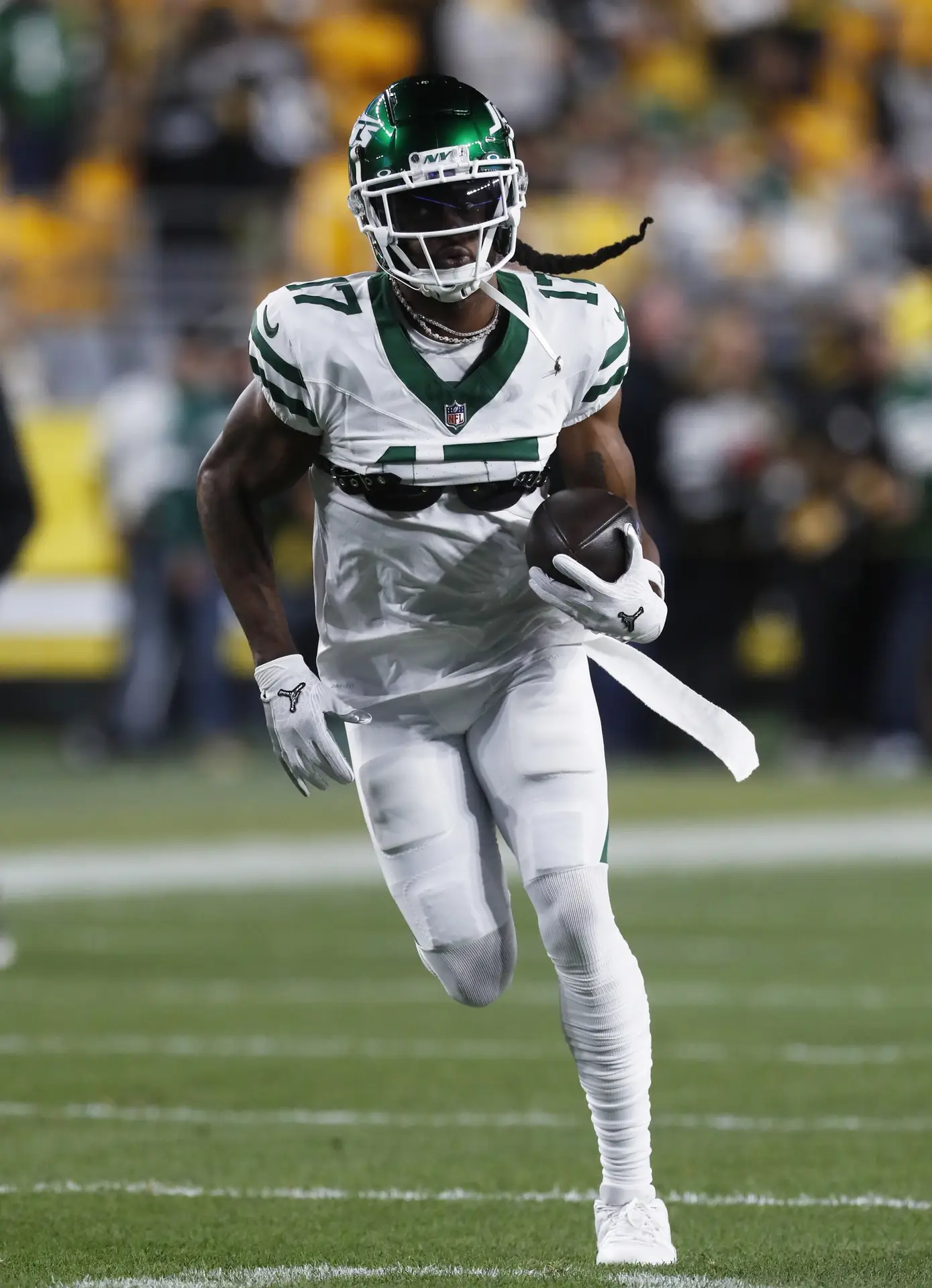 Oct 20, 2024; Pittsburgh, Pennsylvania, USA; New York Jets wide receiver Davante Adams (17) warms up before the game against the Pittsburgh Steelers at Acrisure Stadium. Mandatory Credit: Charles LeClaire-Imagn Images