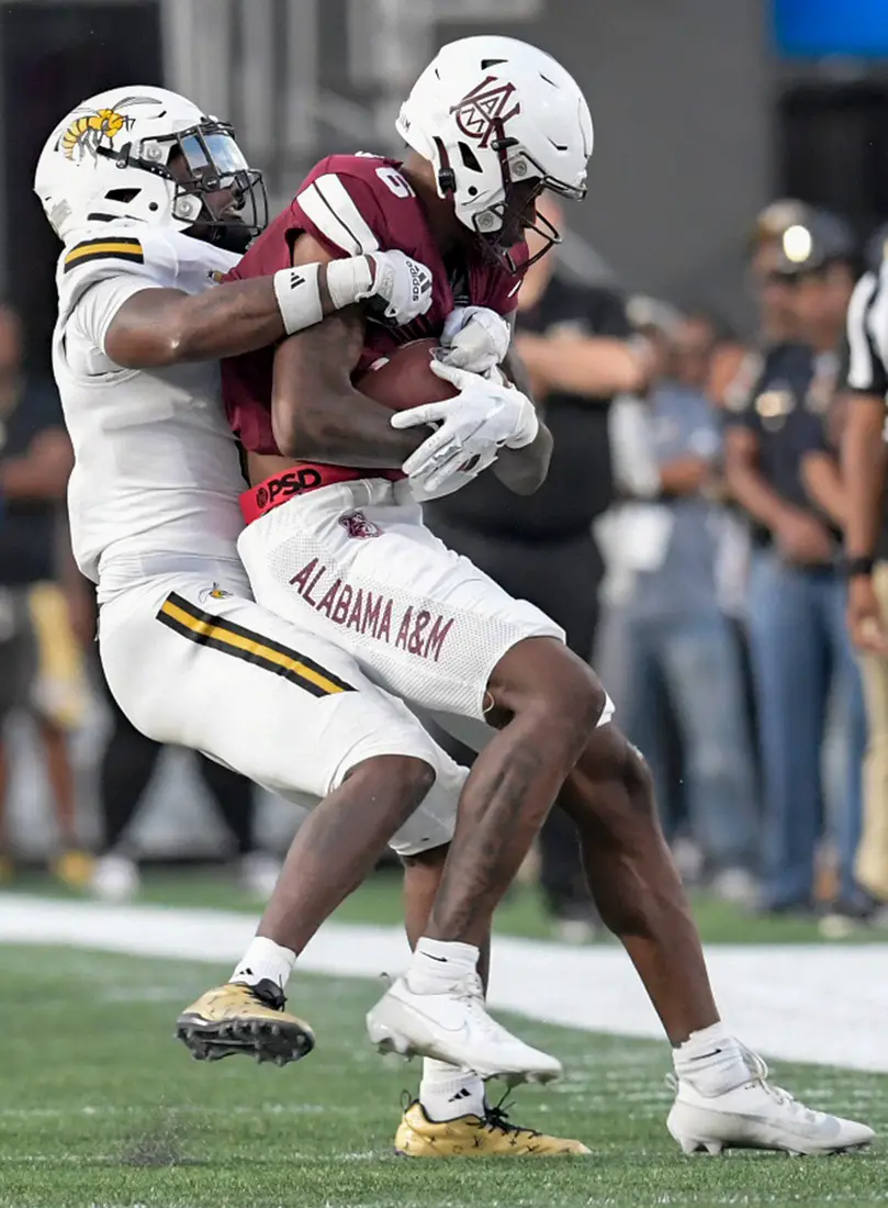 Alabama State linebacker DeMarkus Cunningham (6) stops Alabama A&M wide receiver Keenan Hambrick (6) in the Magic City Classic at Legion Field in Birmingham, Ala., on Saturday October 26, 2024. © Mickey Welsh / Advertiser / USA TODAY NETWORK via Imagn Images