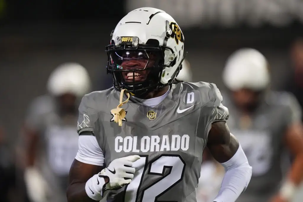 Oct 26, 2024; Boulder, Colorado, USA; Colorado Buffaloes wide receiver Travis Hunter (12) reacts after touchdown reception in the first quarter against the Cincinnati Bearcats at Folsom Field. Mandatory Credit: Ron Chenoy-Imagn Images