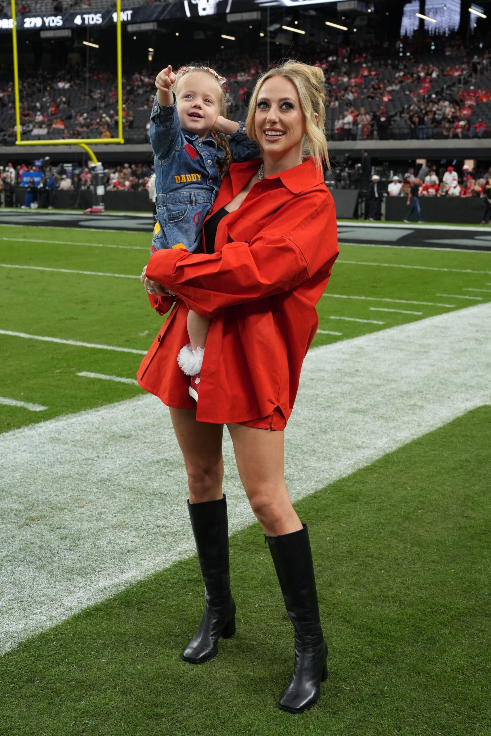 Oct 27, 2024; Paradise, Nevada, USA; Brittany Mahomes, the wife of Kansas City Chiefs quarterback Patrick Mahomes (15) holds daughter Sterling Mahomes during the game against the Las Vegas Raiders at Allegiant Stadium. Mandatory Credit: Kirby Lee-Imagn Images