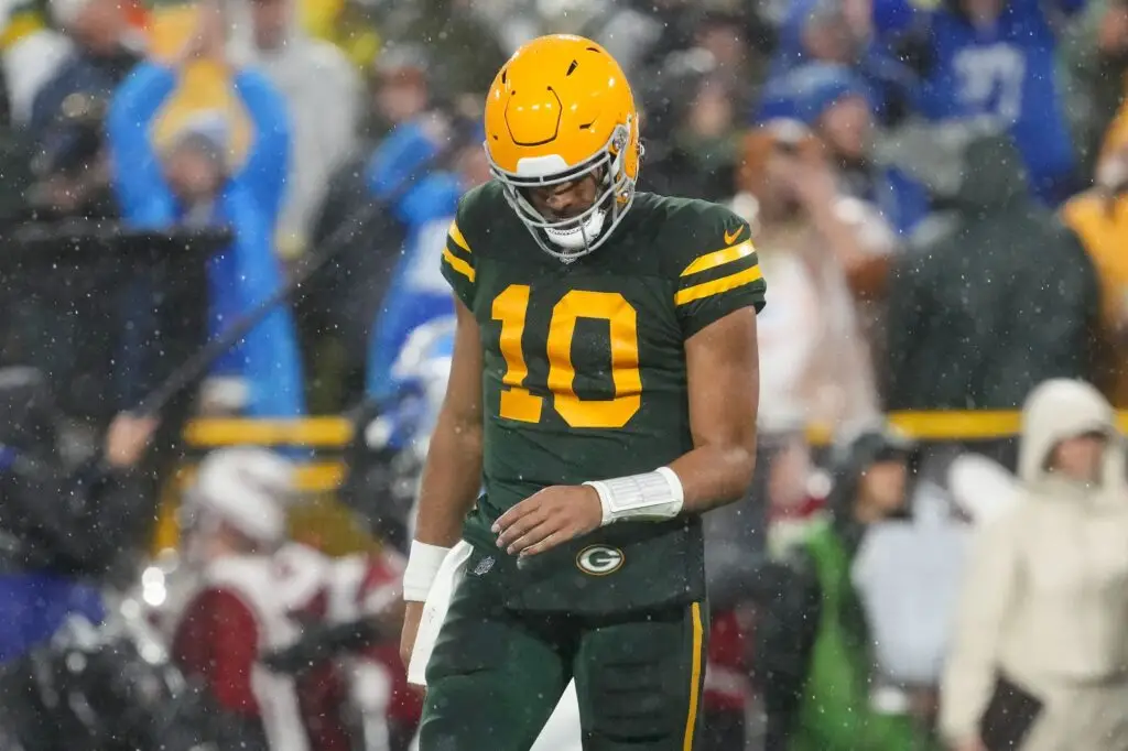 Nov 3, 2024; Green Bay, Wisconsin, USA; Green Bay Packers quarterback Jordan Love (10) hangs his head after throwing an interception during the second quarter against the Detroit Lions at Lambeau Field. Mandatory Credit: Jeff Hanisch-Imagn Images