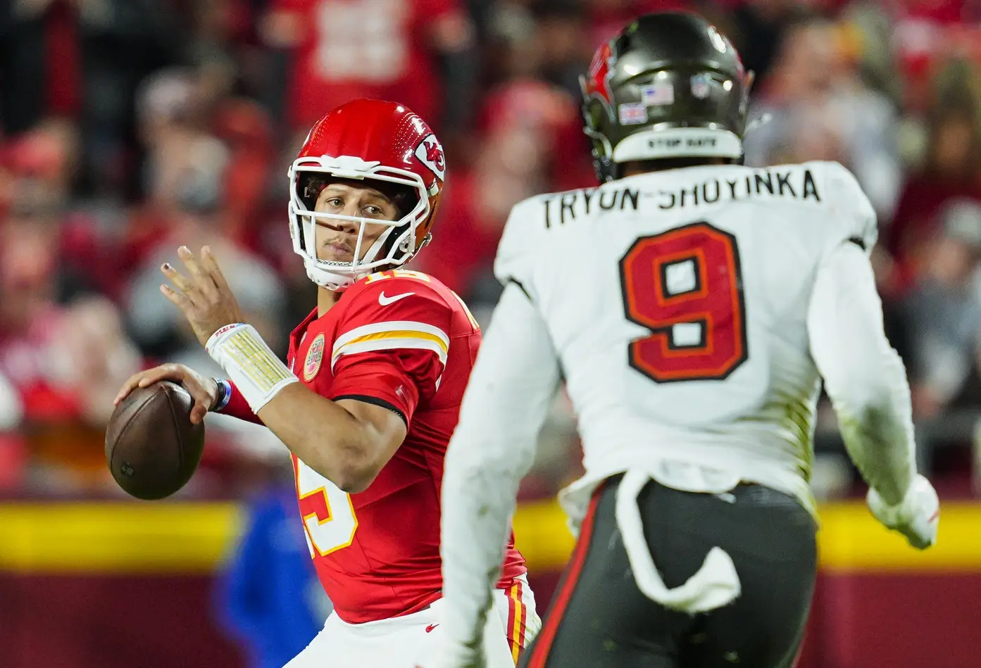 What Now? 2021 1st Round Picks With Declined 5th-Year Options Pt 3 4 Nov 4, 2024; Kansas City, Missouri, USA; Kansas City Chiefs quarterback Patrick Mahomes (15) throws a pass against Tampa Bay Buccaneers linebacker Joe Tryon-Shoyinka (9) at GEHA Field at Arrowhead Stadium. Mandatory Credit: Jay Biggerstaff-Imagn Images