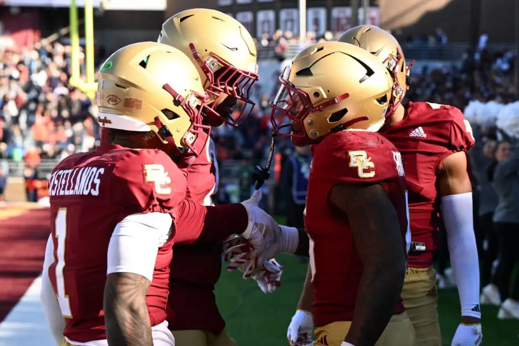 Boston College Eagles running back Kye Robichaux (5) celebrates with quarterback Thomas Castellanos (1) after scoring a touchdown against the Syracuse Orange 