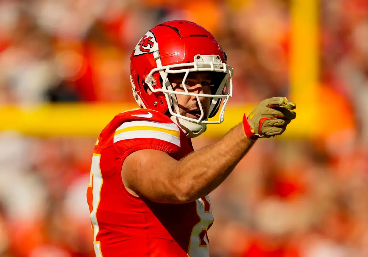 Nov 10, 2024; Kansas City, Missouri, USA; Kansas City Chiefs tight end Travis Kelce (87) celebrates a first down during the first half against the Denver Broncos at GEHA Field at Arrowhead Stadium. Mandatory Credit: Jay Biggerstaff-Imagn Images