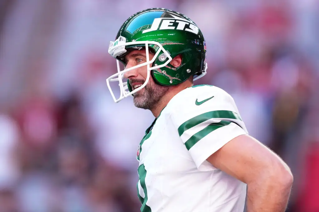 New York Jets Nov 10, 2024; Glendale, Arizona, USA; New York Jets quarterback Aaron Rodgers (8) warms up before the game against the Arizona Cardinals at State Farm Stadium. Mandatory Credit: Joe Camporeale-Imagn Images