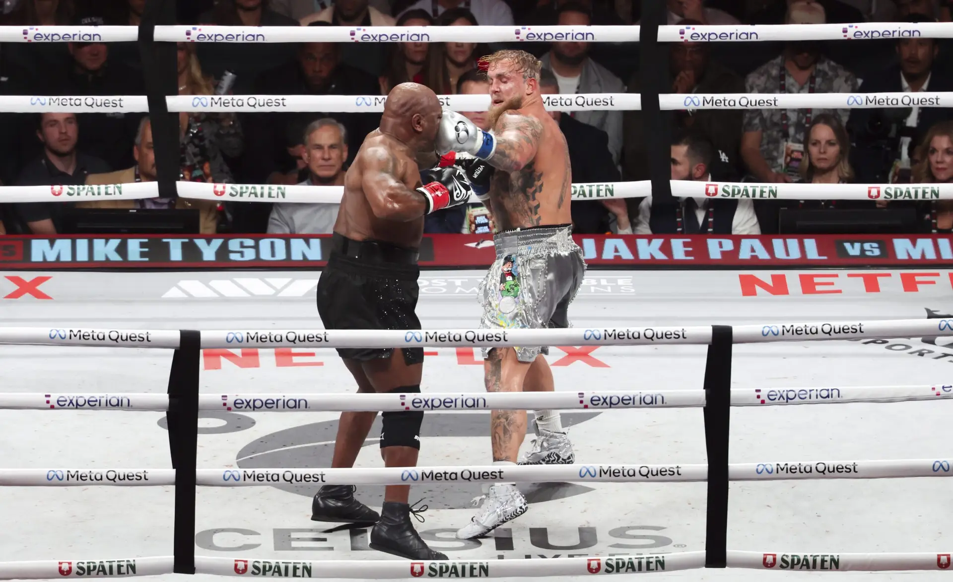 Nov 15, 2024; Arlington, Texas, UNITED STATES; Mike Tyson (black gloves) fights Jake Paul (silver gloves) at AT&T Stadium. Mandatory Credit: Kevin Jairaj-Imagn Images