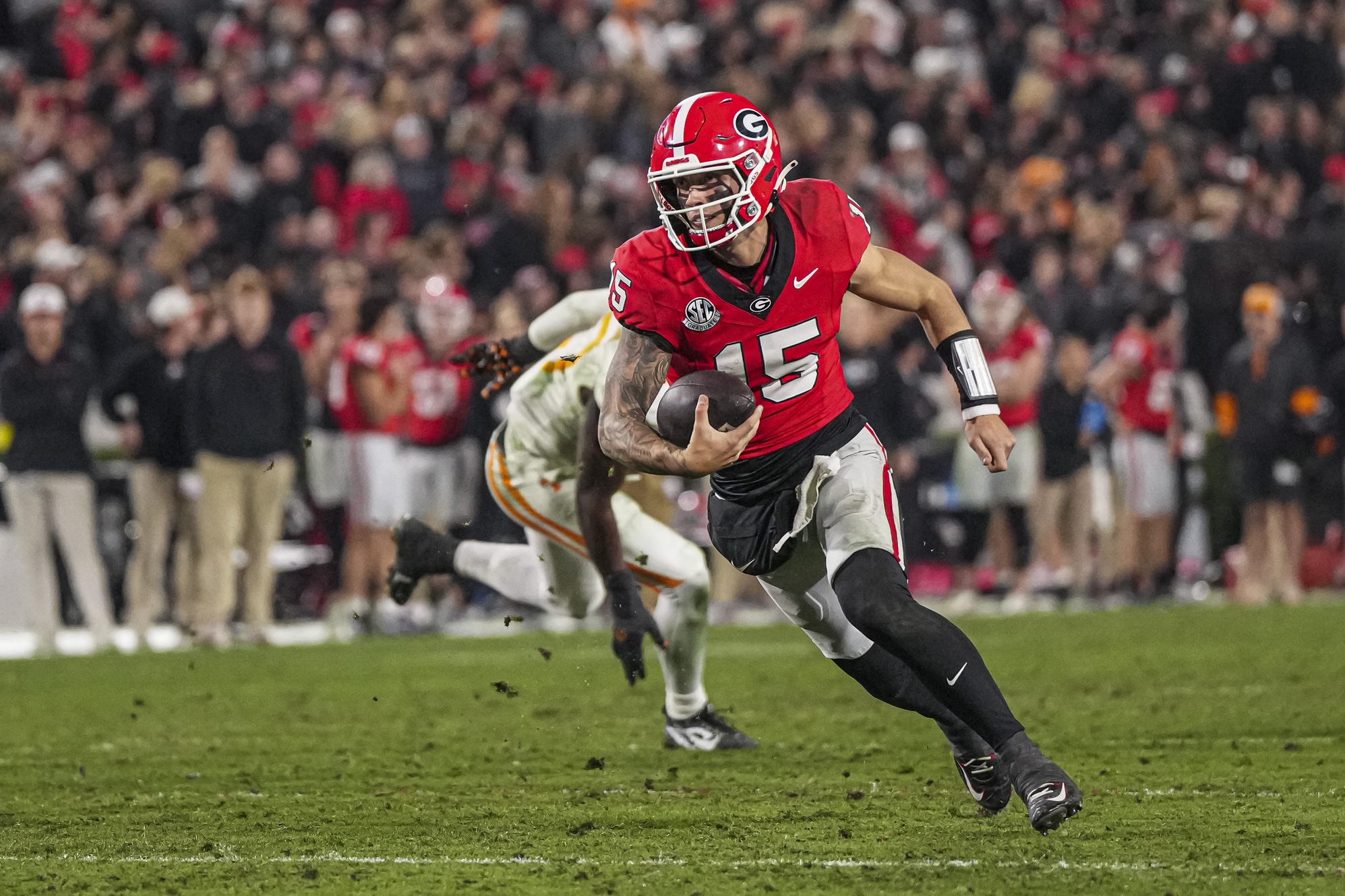 Nov 16, 2024; Athens, Georgia, USA; Georgia Bulldogs quarterback Carson Beck (15) runs for a touchdown against the Tennessee Volunteers during the second half at Sanford Stadium. Mandatory Credit: Dale Zanine-Imagn Images