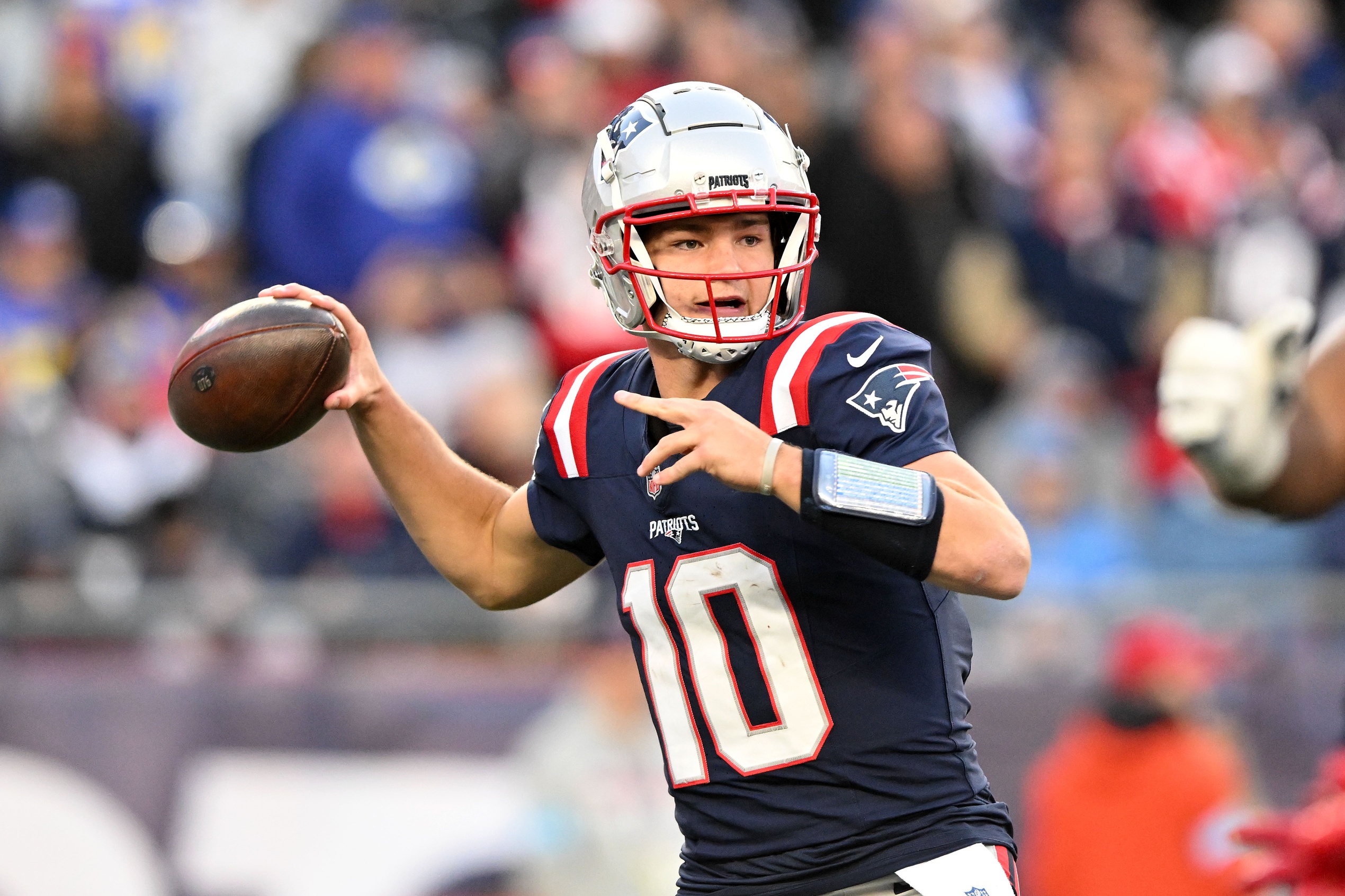 Nov 17, 2024; Foxborough, Massachusetts, USA; New England Patriots quarterback Drake Maye (10) throws the ball against the Los Angeles Rams during the second half at Gillette Stadium. Mandatory Credit: Brian Fluharty-Imagn Images