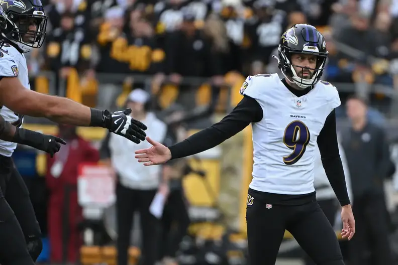 Nov 17, 2024; Pittsburgh, Pennsylvania, USA; PBaltimore Ravens place kicker Justin Tucker (9) celebrates a 54 yard filed goal against the Pittsburgh Steelers during the third quarter at Acrisure Stadium. Mandatory Credit: Barry Reeger-Imagn Images