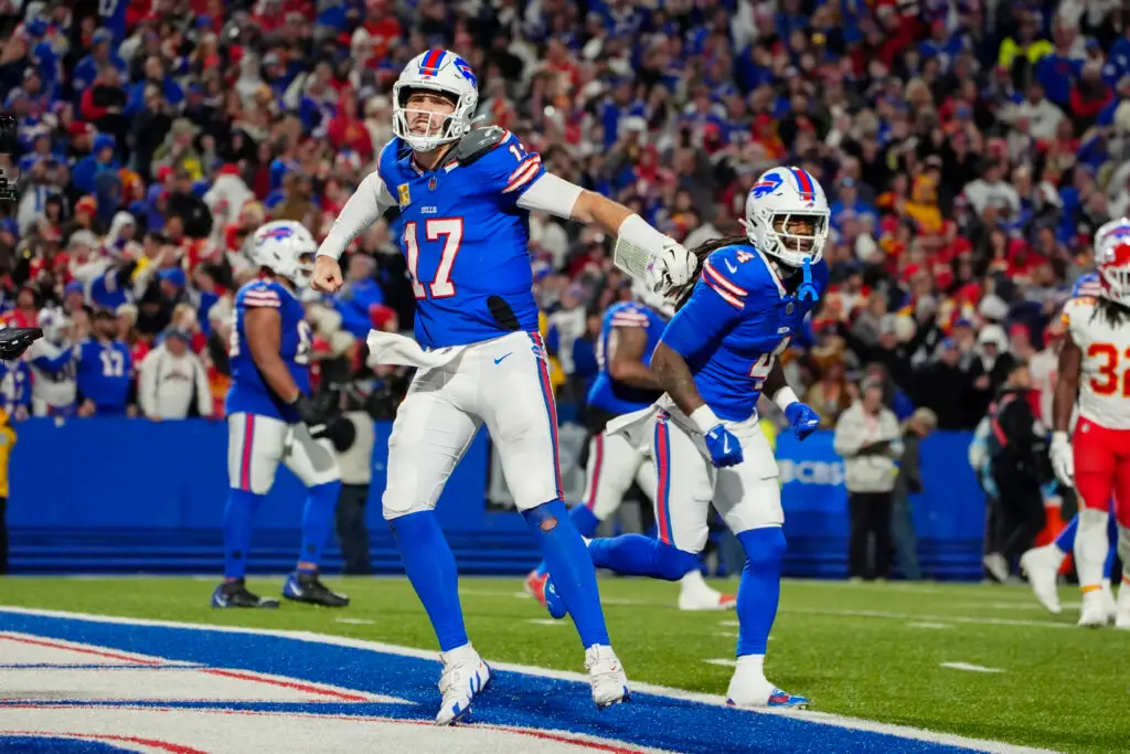 Nov 17, 2024; Orchard Park, New York, USA; Buffalo Bills quarterback Josh Allen (17) reacts to scoring a touchdown against the Kansas City Chiefs during the second half at Highmark Stadium. Mandatory Credit: Gregory Fisher-Imagn Images