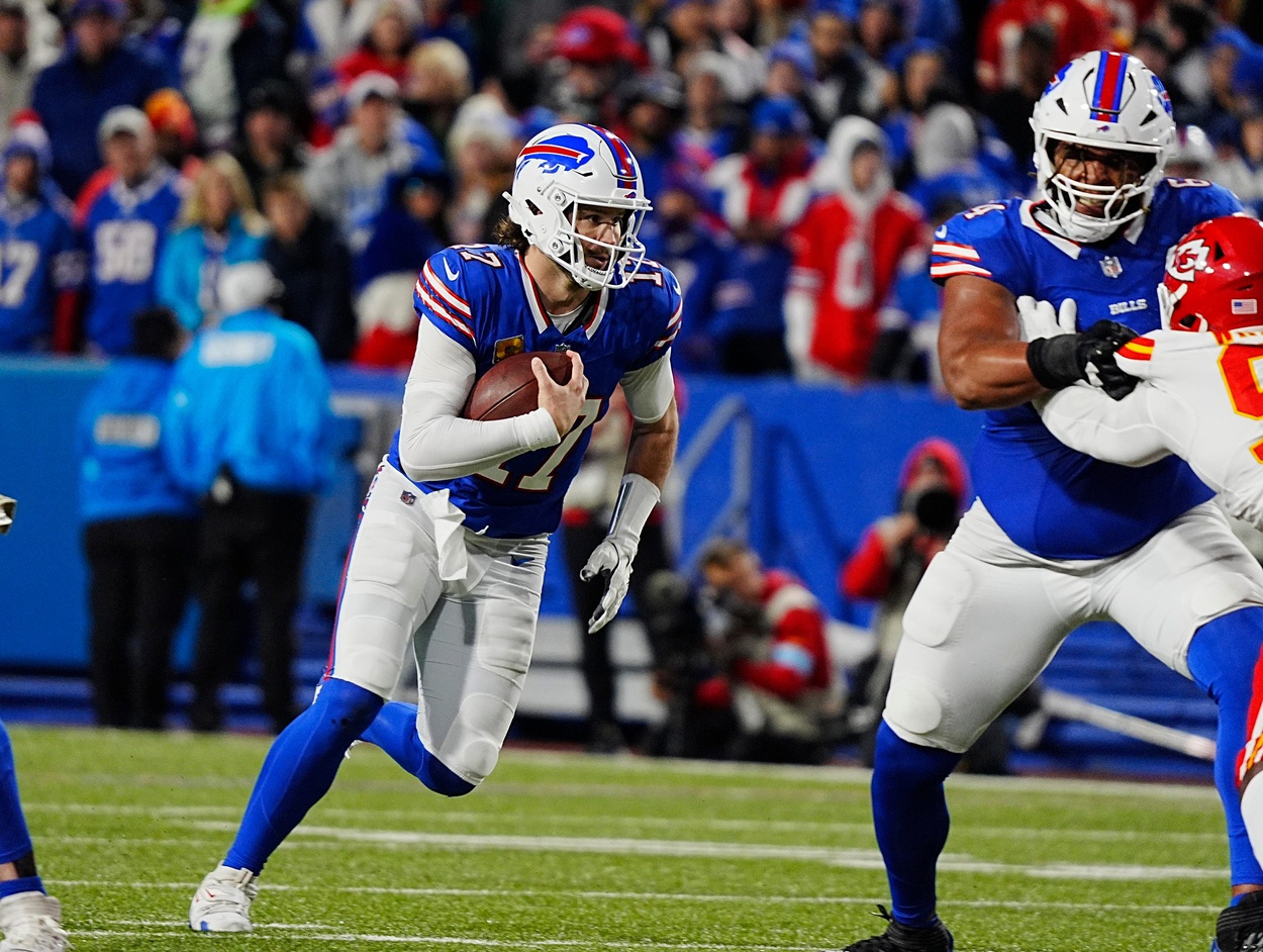 Bill's O'Cyrus Torrence blocks a Kansas City player while teammate Josh Allen gets ready to run during first half action against the Kansas City Chiefs in Orchard Park, Nov.17, 2024. © Tina MacIntyre-Yee/Democrat and Chronicle / USA TODAY NETWORK via Imagn Images