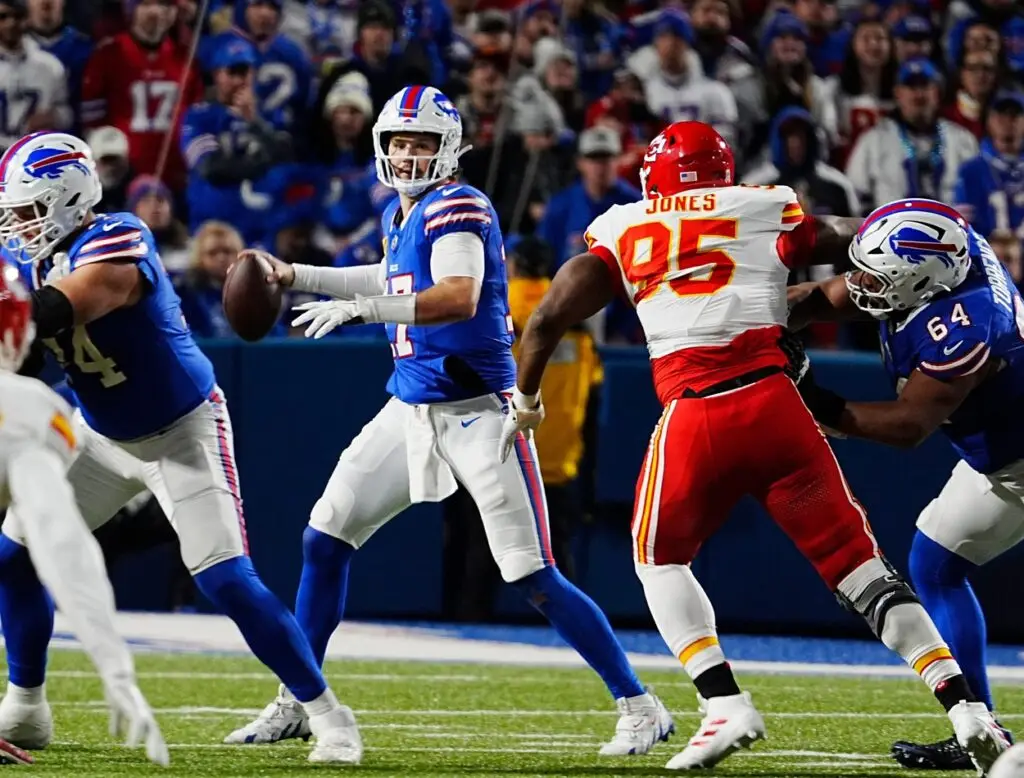 Bills quarterback Josh Allen gets ready to throw a pass as Kansas City's Chris Jones heads for him during first half action against the Kansas City Chiefs in Orchard Park, Nov.17, 2024. © Tina MacIntyre-Yee/Democrat and Chronicle / USA TODAY NETWORK via Imagn Images