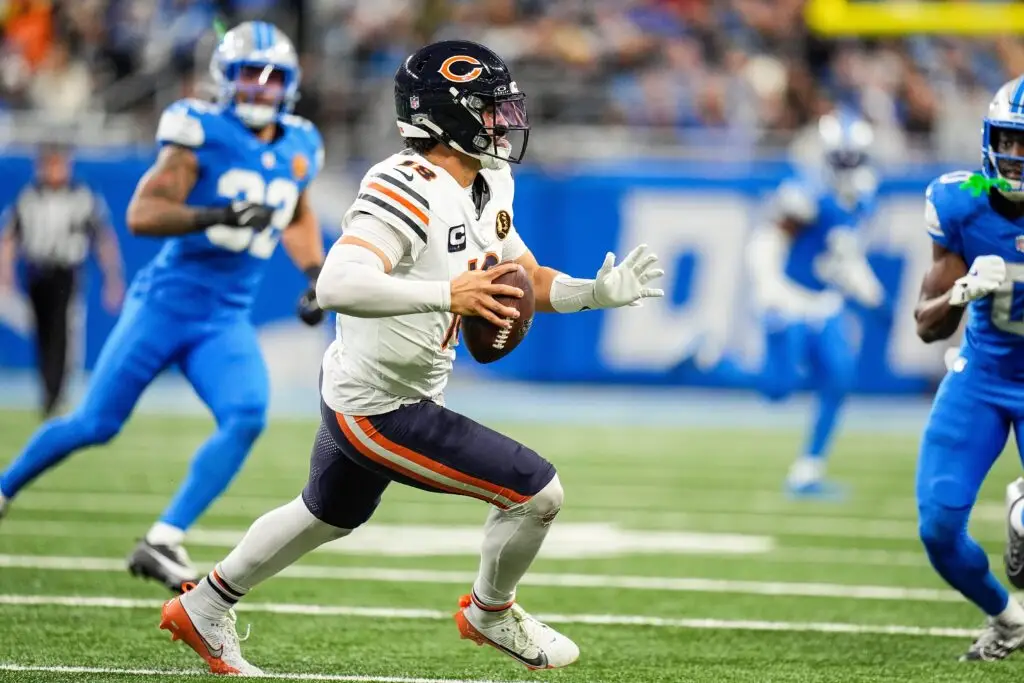 Chicago Bears quarterback Caleb Williams (18) runs against Detroit Lions during the second half at Ford Field in Detroit on Thursday, Nov. 28, 2024. © Junfu Han / USA TODAY NETWORK via Imagn Images