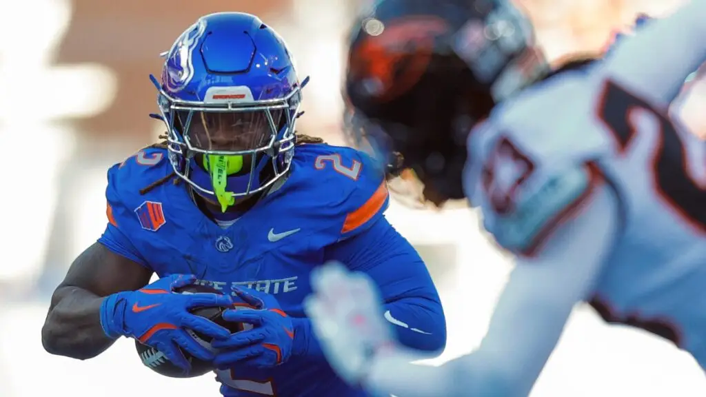 Boise State running back Ashton Jeanty (2) runs with the ball late in the second half against Oregon State in an NCAA college football game.Credit: AP Photo/Steve Conner