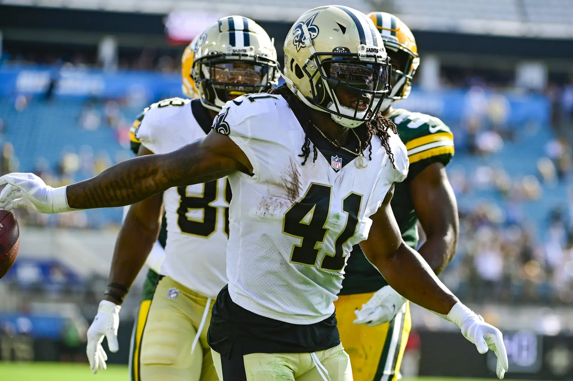 Sep 12, 2021; Jacksonville, Florida, USA; New Orleans Saints running back Alvin Kamara (41) reacts after scoring a second quarter touchdown against the Green Bay Packers at TIAA Bank Field. Mandatory Credit: Tommy Gilligan-Imagn Images