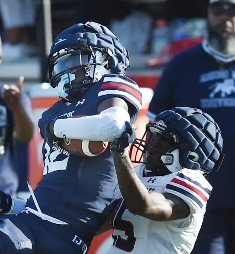 Jackson State's Travis Hunter (#12) goes a down with WR Trevonte Rucker (#15) after Hunter intercepted a pass thrown by Shedeur Sanders during JSU's spring game at Veterans Memorial Stadium in Jackson, Miss., Sunday, April 24, 2022. © Barbara Gauntt/Clarion Ledger / USA TODAY NETWORK