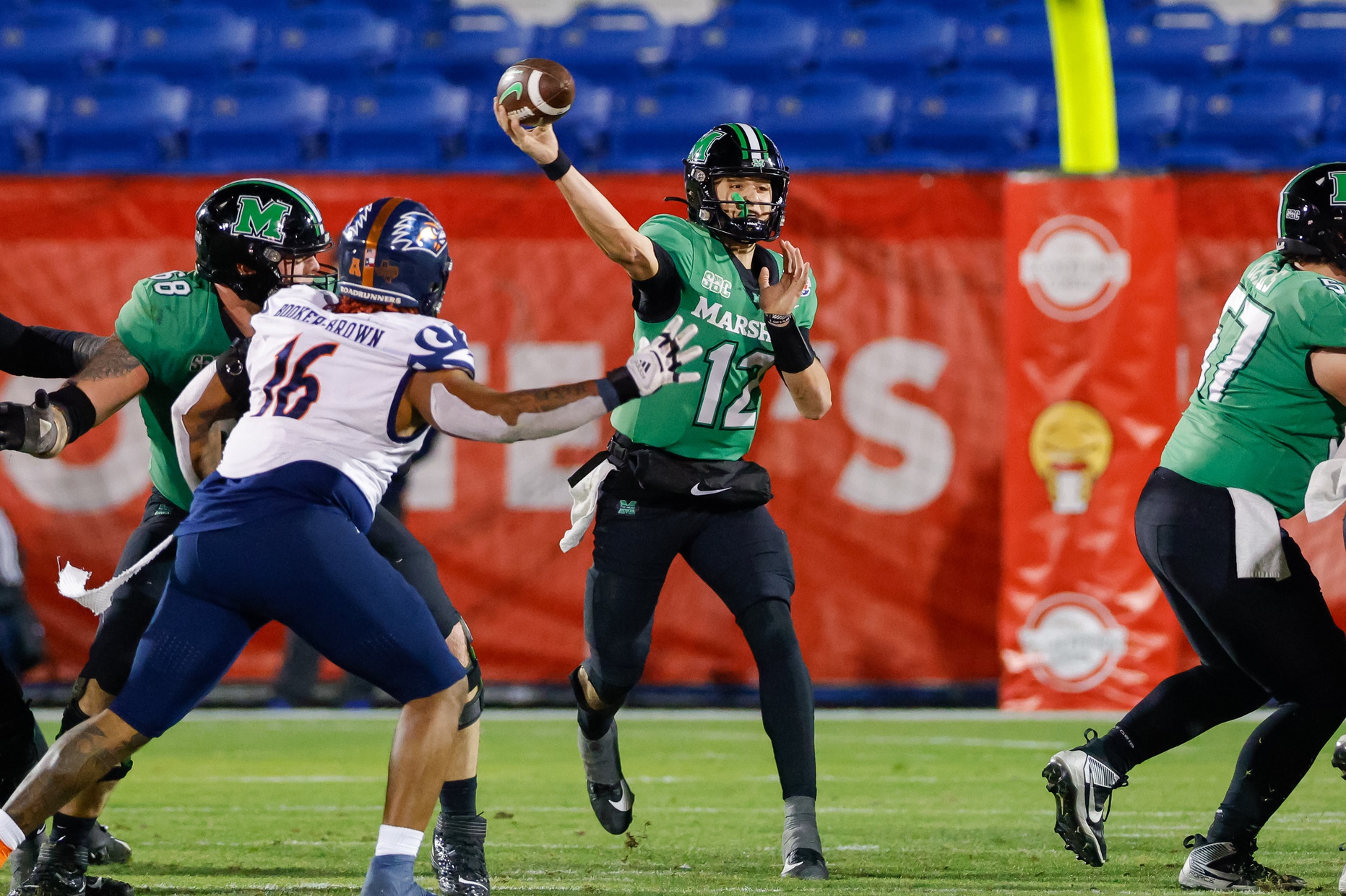 Dec 19, 2023; Frisco, TX, USA; Marshall Thundering Herd quarterback Cole Pennington (12) throws a pass during the fourth quarter against the UTSA Roadrunners at Toyota Stadium. Mandatory Credit: Andrew Dieb-Imagn Images Jets