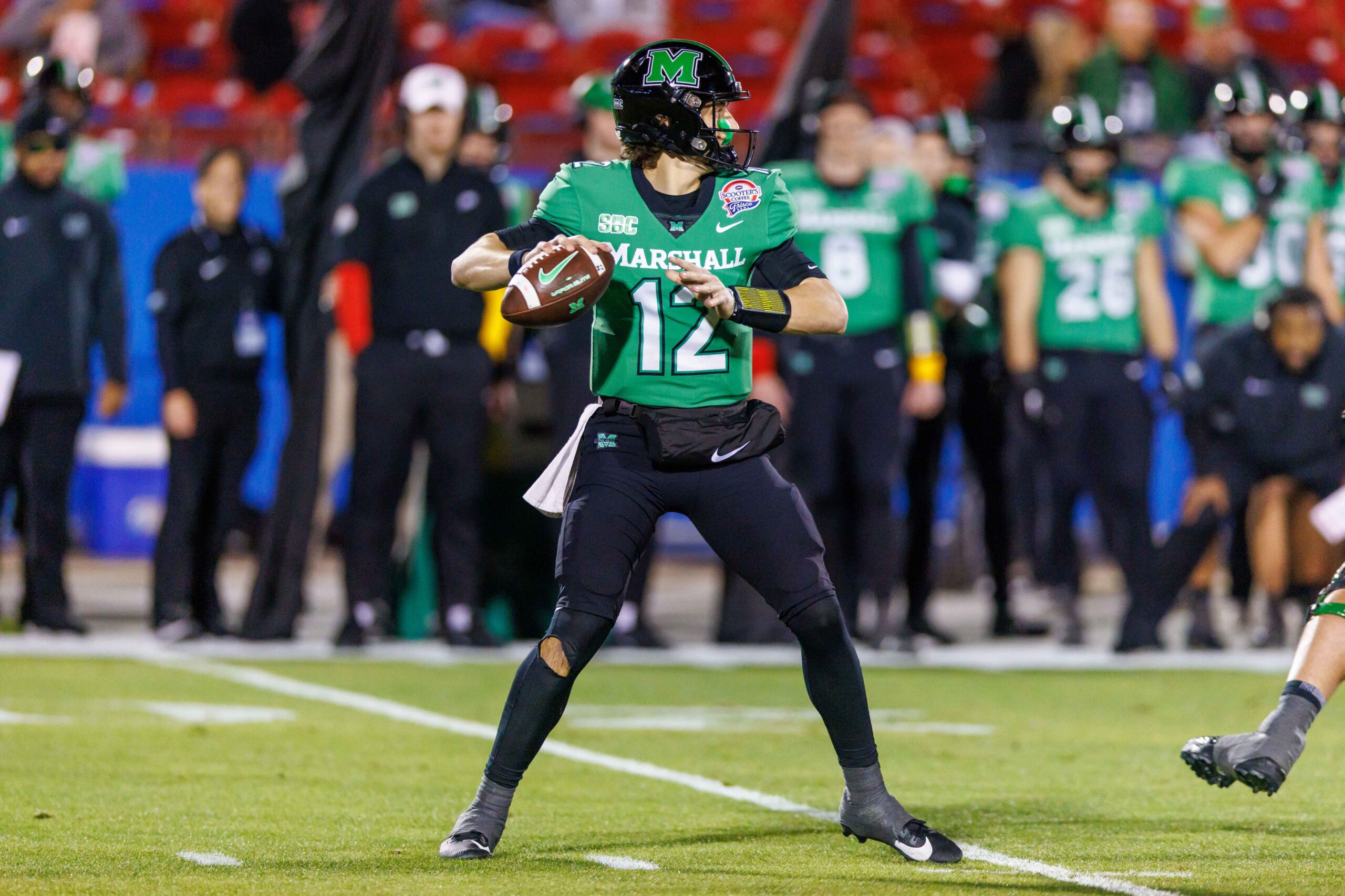 Dec 19, 2023; Frisco, TX, USA; Marshall Thundering Herd quarterback Cole Pennington (12) during the first quarter against the UTSA Roadrunners at Toyota Stadium. Mandatory Credit: Andrew Dieb-Imagn Images