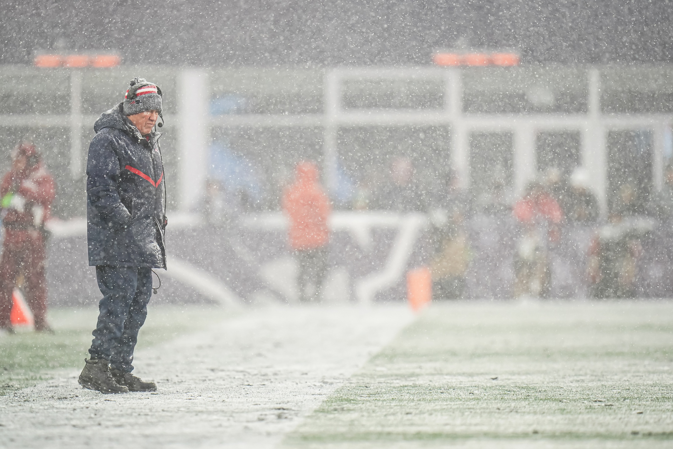 Jan 7, 2024; Foxborough, Massachusetts, USA; New England Patriots head coach Bill Belichick watches from the sideline as they take on the New York Jets at Gillette Stadium. Mandatory Credit: David Butler II-Imagn Images