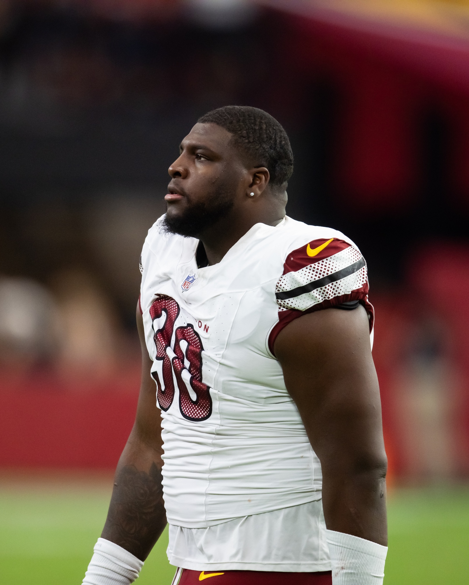 Sep 29, 2024; Glendale, Arizona, USA; Washington Commanders defensive tackle Phidarian Mathis (98) against the Arizona Cardinals at State Farm Stadium. Mandatory Credit: Mark J. Rebilas-Imagn Images Jets