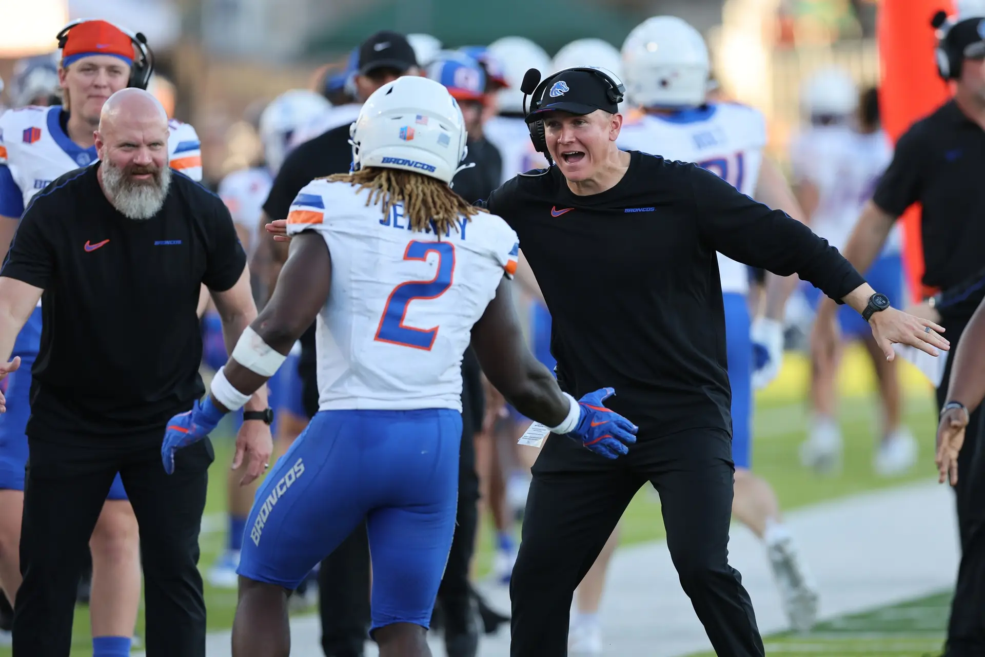 Boise State Broncos head coach Spencer Danielson reacts with running back Ashton Jeanty (2)