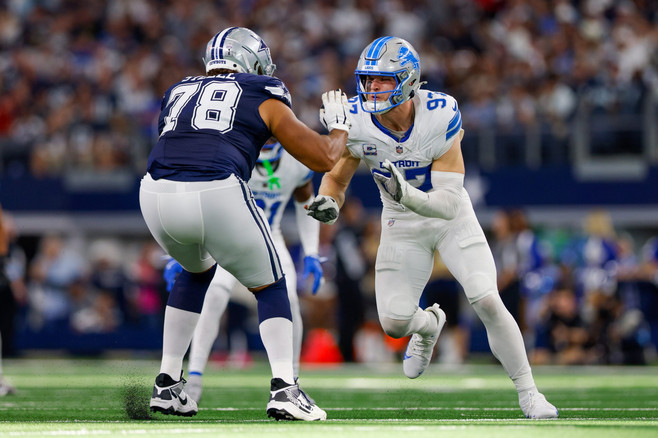 Oct 13, 2024; Arlington, Texas, USA; Detroit Lions defensive end Aidan Hutchinson (97) rushes the passer with Dallas Cowboys offensive tackle Terence Steele (78) blocking during the third quarter at AT&T Stadium. Mandatory Credit: Andrew Dieb-Imagn Images