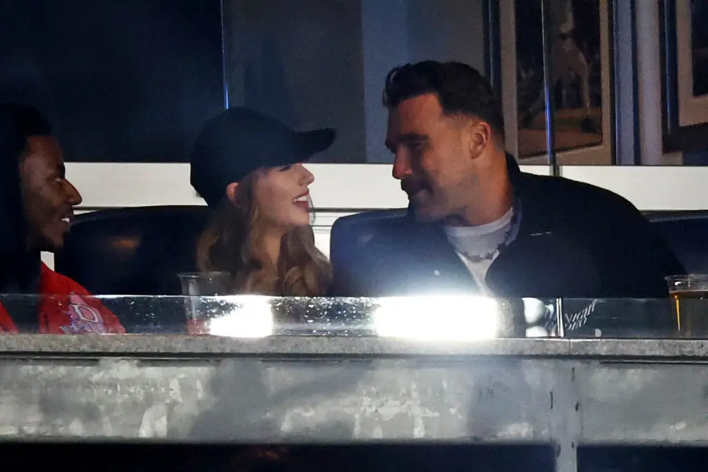 Oct 14, 2024; Bronx, New York, USA; Recording artist Taylor Swift and Kansas City Chiefs tight end Travis Kelce watch game one of the ALCS for the 2024 MLB Playoffs between the New York Yankees and the Cleveland Guardians at Yankee Stadium. Mandatory Credit: Vincent Carchietta-Imagn Images