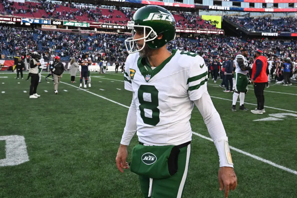 Oct 27, 2024; Foxborough, Massachusetts, USA; New York Jets quarterback Aaron Rodgers (8) walks off of the field after a game against the New England Patriots at Gillette Stadium. Mandatory Credit: Brian Fluharty-Imagn Images