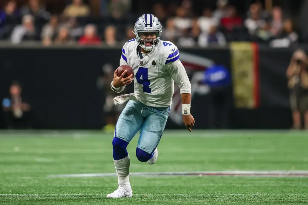 Nov 3, 2024; Atlanta, Georgia, USA; Dallas Cowboys quarterback Dak Prescott (4) scrambles against the Atlanta Falcons in the third quarter at Mercedes-Benz Stadium. Mandatory Credit: Brett Davis-Imagn Images