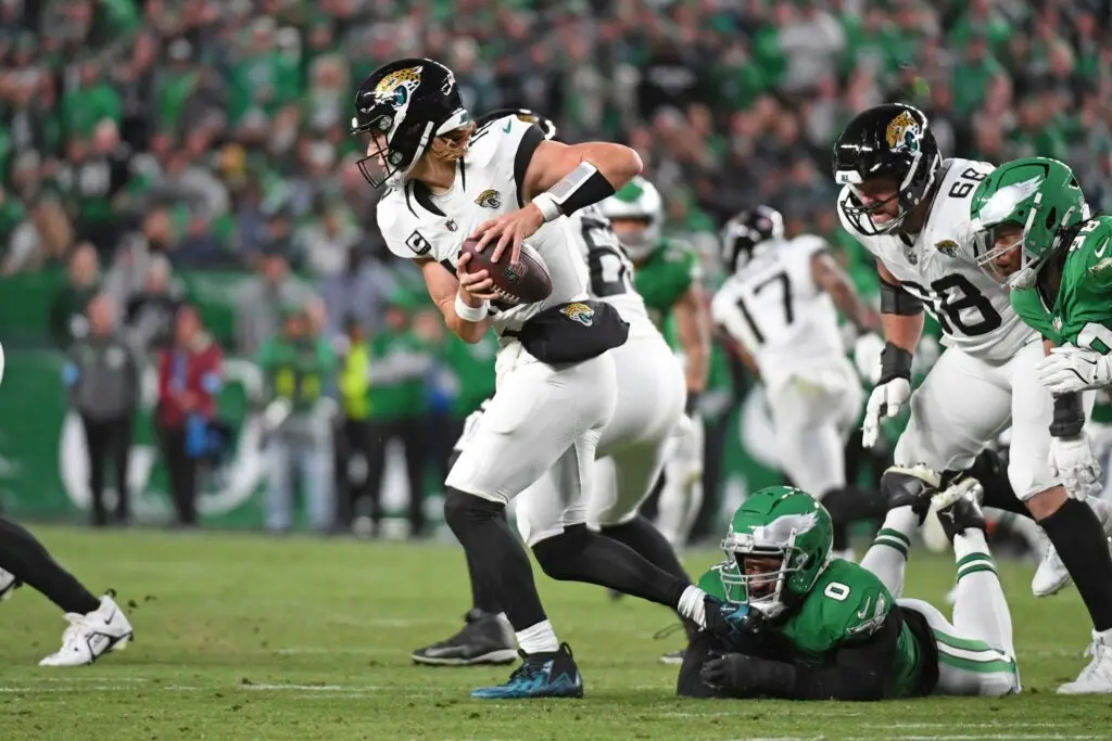 Eagles Trade Edge Rusher Bryce Huff to NFC Rival 49ers 4 Jacksonville Jaguars quarterback Trevor Lawrence (16) and Philadelphia Eagles defensive end Bryce Huff (0)