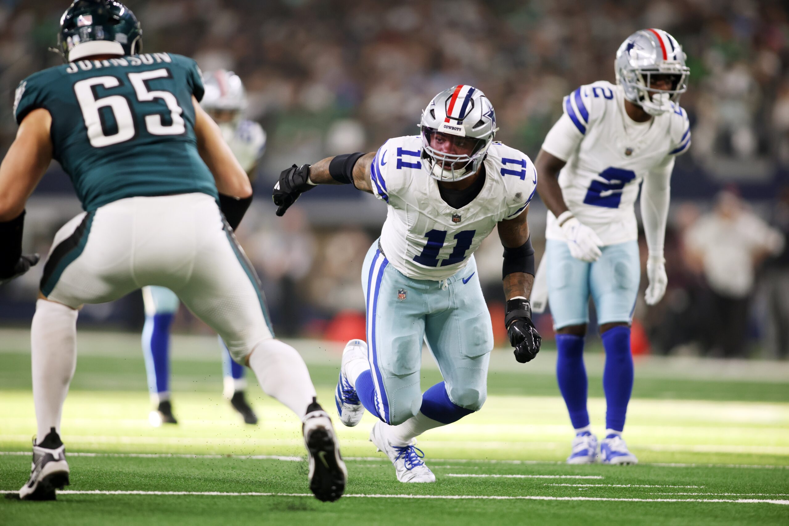 Nov 10, 2024; Arlington, Texas, USA; Dallas Cowboys linebacker Micah Parsons (11) rushes the passer in the game against the Philadelphia Eagles at AT&T Stadium. Mandatory Credit: Tim Heitman-Imagn Images