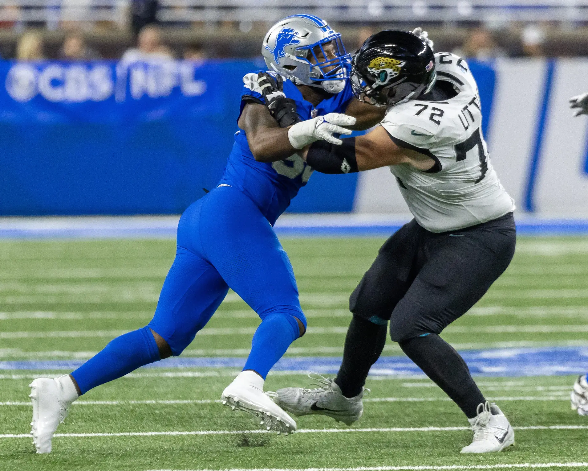 Nov 17, 2024; Detroit, Michigan, USA; Jacksonville Jaguars offensive tackle Walker Little (72) defends against Detroit Lions defensive end Za'Darius Smith (99) during the second half at Ford Field. Mandatory Credit: David Reginek-Imagn Images Packers