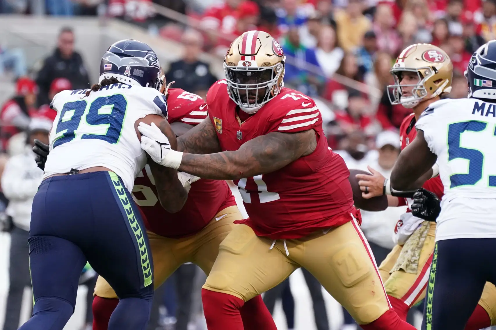 Nov 17, 2024; Santa Clara, California, USA; San Francisco 49ers offensive tackle Trent Williams (71) blocks Seattle Seahawks defensive end Leonard Williams (99) in the third quarter at Levi's Stadium. Mandatory Credit: David Gonzales-Imagn Images
