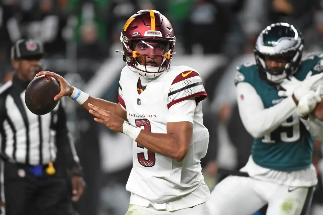 Nov 14, 2024; Philadelphia, Pennsylvania, USA; Washington Commanders quarterback Jayden Daniels (5) against the Philadelphia Eagles at Lincoln Financial Field. Mandatory Credit: Eric Hartline-Imagn Images