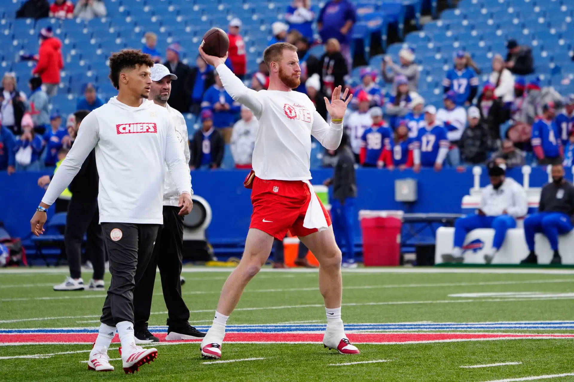 Nov 17, 2024; Orchard Park, New York, USA; Kansas City Chiefs quarterback Carson Wentz (11) warms up with Kansas City Chiefs quarterback Patrick Mahomes (15) prior to the game against the Buffalo Bills at Highmark Stadium. Mandatory Credit: Gregory Fisher-Imagn Images Jets