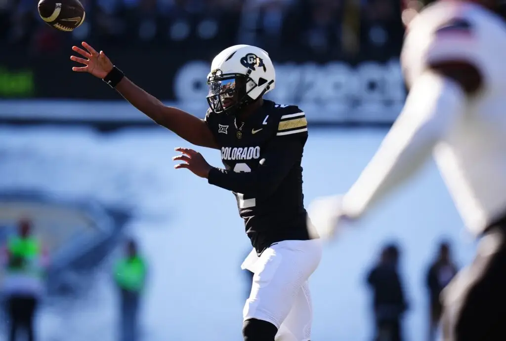 Nov 29, 2024; Boulder, Colorado, USA; Colorado Buffaloes quarterback Shedeur Sanders (2) passes the ball in the first quarter against the Oklahoma State Cowboys at Folsom Field. Mandatory Credit: Ron Chenoy-Imagn Images