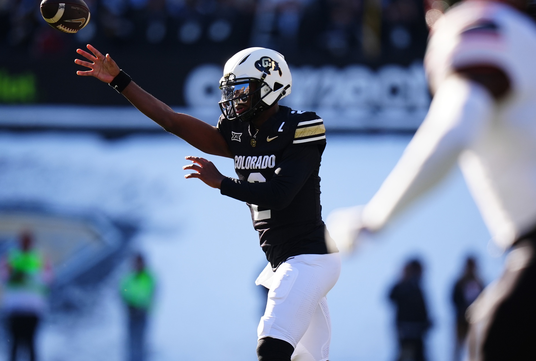 Nov 29, 2024; Boulder, Colorado, USA; Colorado Buffaloes quarterback Shedeur Sanders (2) passes the ball in the first quarter against the Oklahoma State Cowboys at Folsom Field. Mandatory Credit: Ron Chenoy-Imagn Images