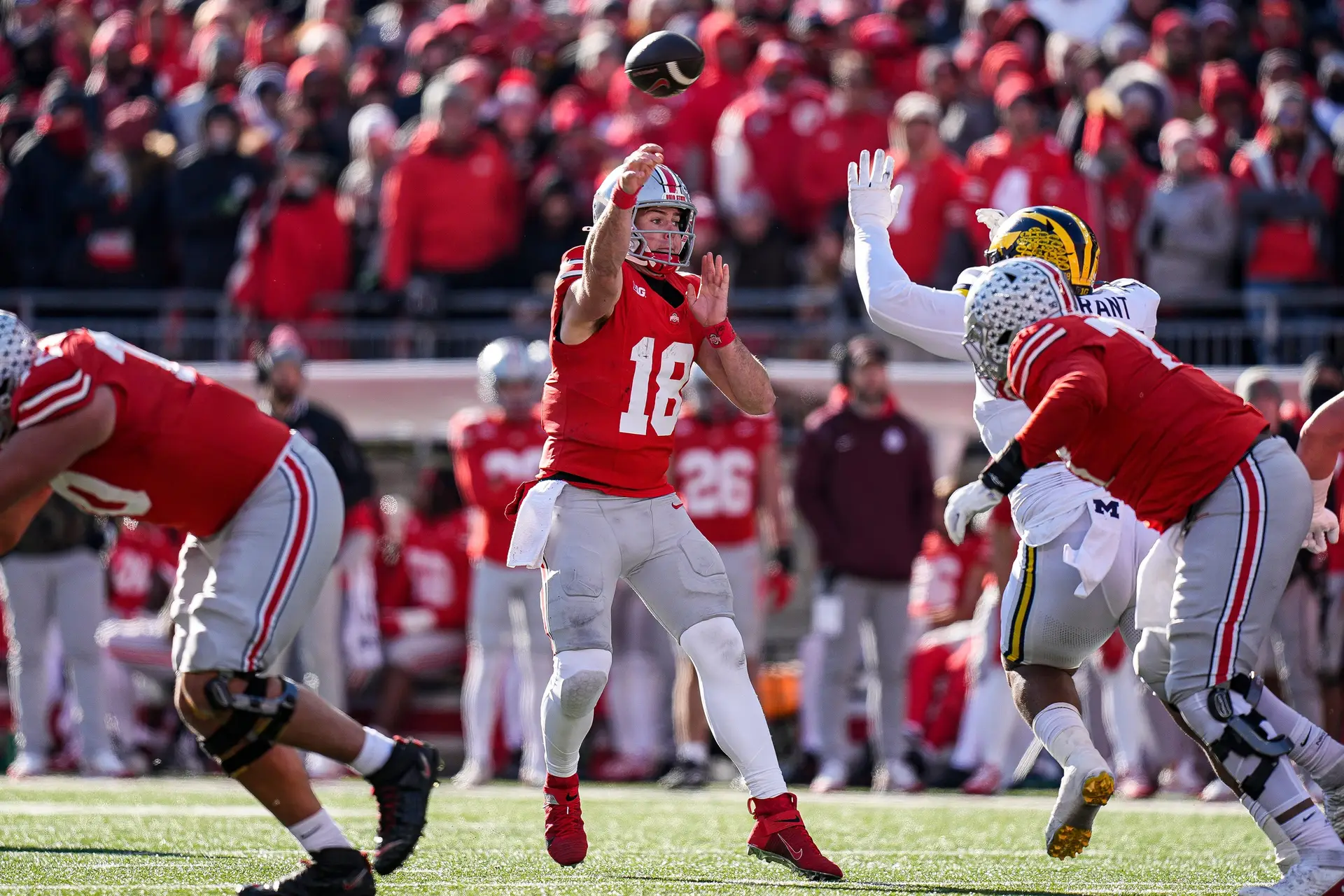 Ohio State quarterback Will Howard (18) makes a pass against Michigan