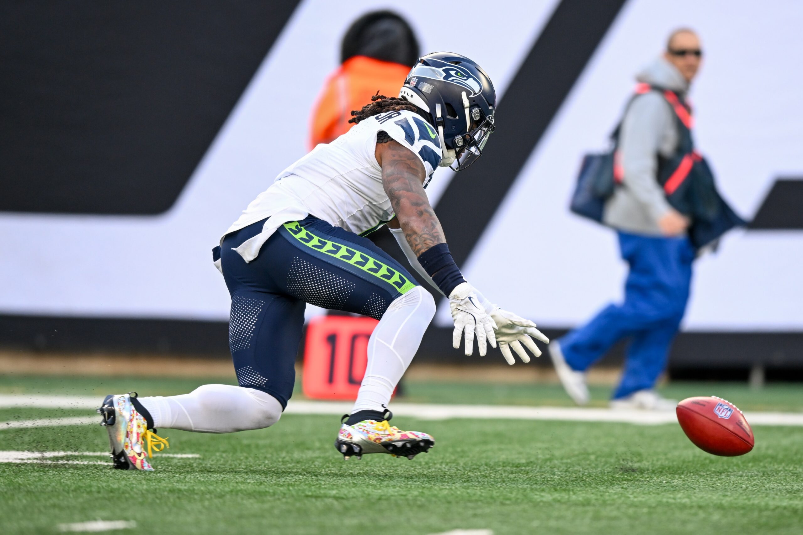 Dec 1, 2024; East Rutherford, New Jersey, USA; Seattle Seahawks wide receiver Laviska Shenault Jr. (1) drops the ball on a kickoff during the second quarter against the New York Jets at MetLife Stadium. Mandatory Credit: Mark Smith-Imagn Images