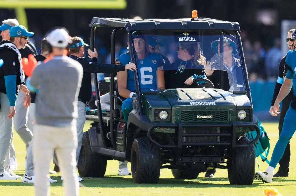 Jacksonville Jaguars quarterback Trevor Lawrence (16) is taken off the field in a medical cart during the second quarter of an NFL football matchup Sunday, Dec. 1, 2024 at EverBank Stadium in Jacksonville, Fla. [Corey Perrine/Florida Times-Union]