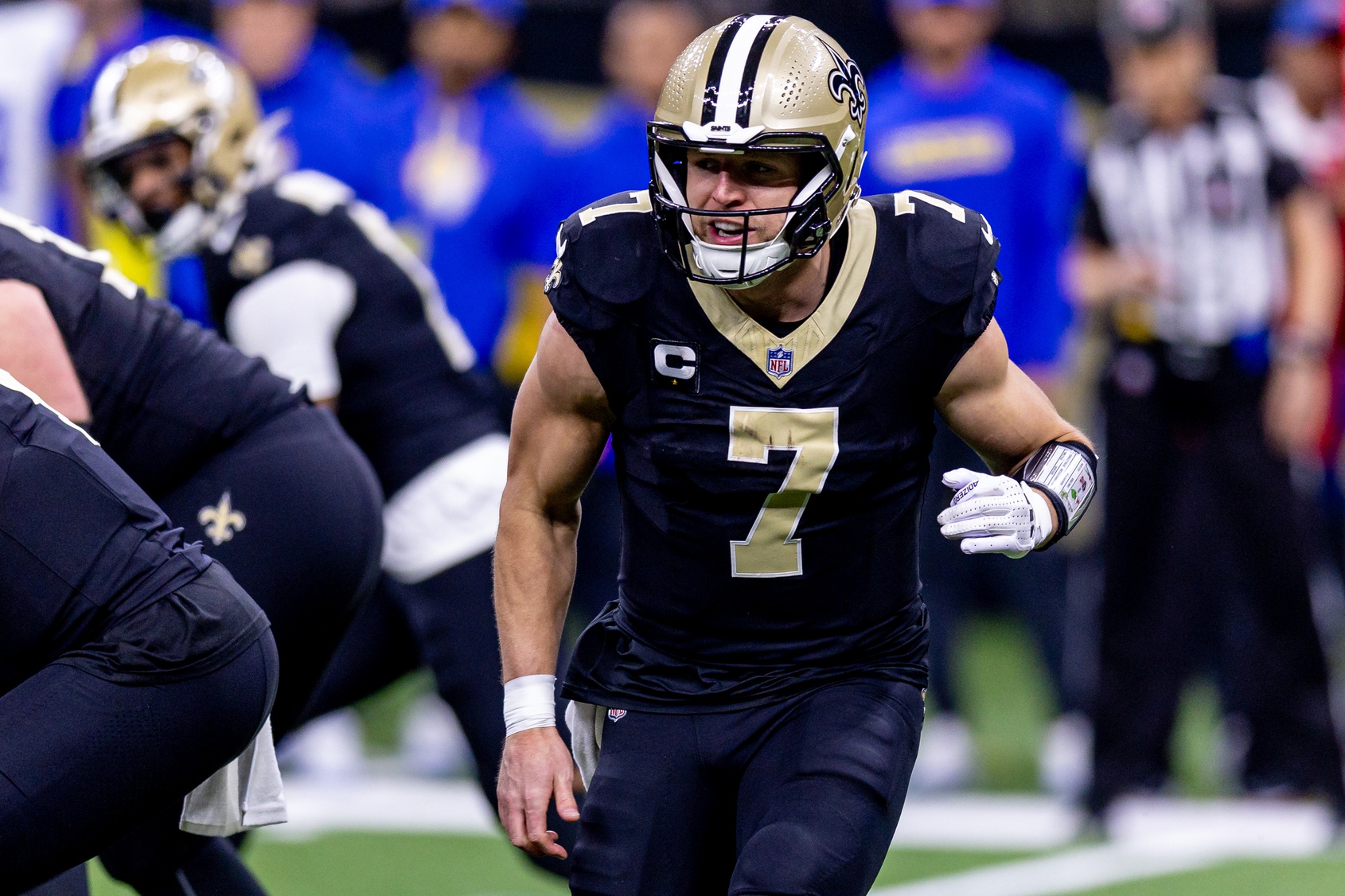 Dec 1, 2024; New Orleans, Louisiana, USA; New Orleans Saints tight end Taysom Hill (7) against the Los Angeles Rams during the first half at Caesars Superdome. Mandatory Credit: Stephen Lew-Imagn Images