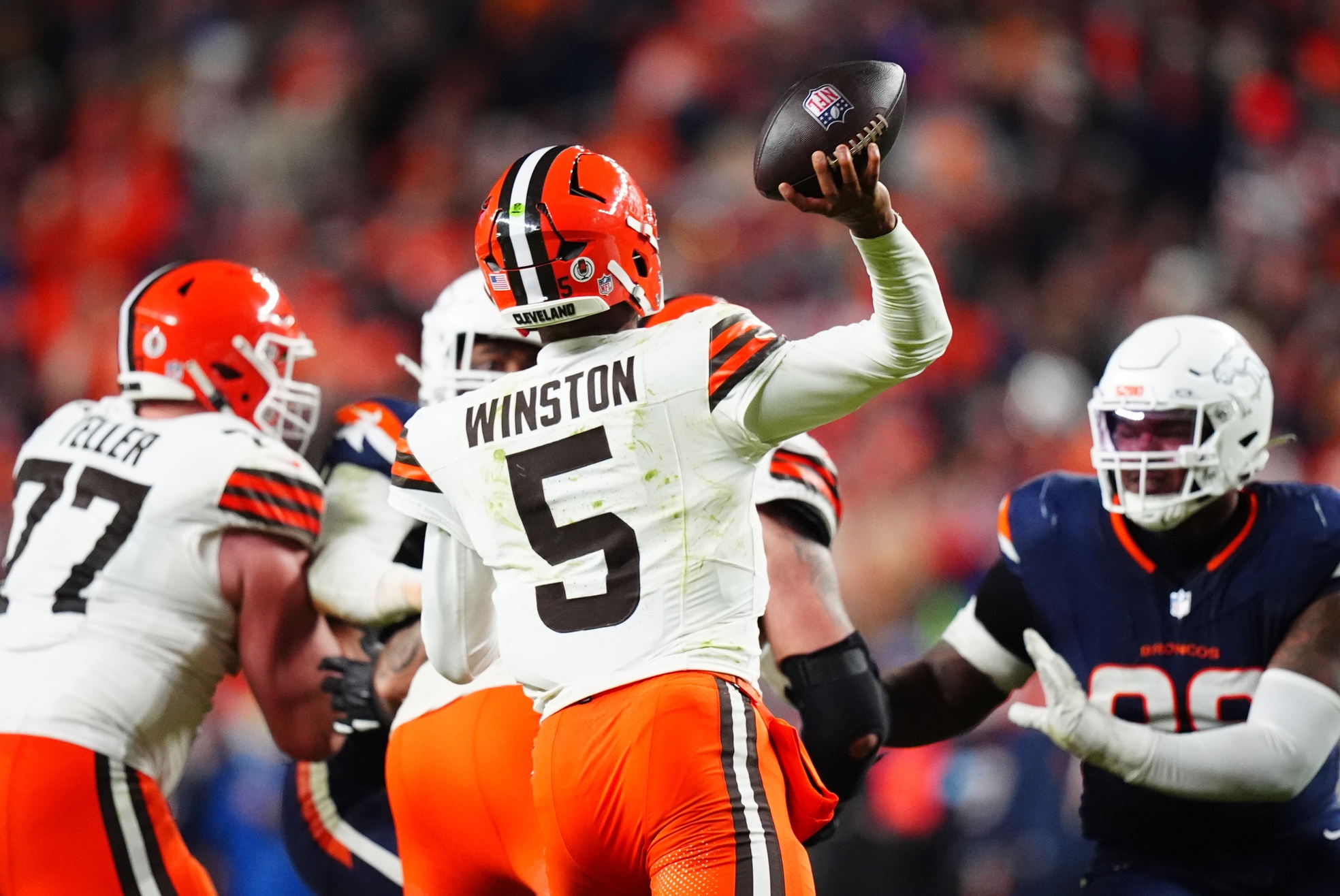 Dec 2, 2024; Denver, Colorado, USA; Cleveland Browns quarterback Jameis Winston (5) passes the ball in the second half against the Denver Broncos at Empower Field at Mile High. Mandatory Credit: Ron Chenoy-Imagn Images