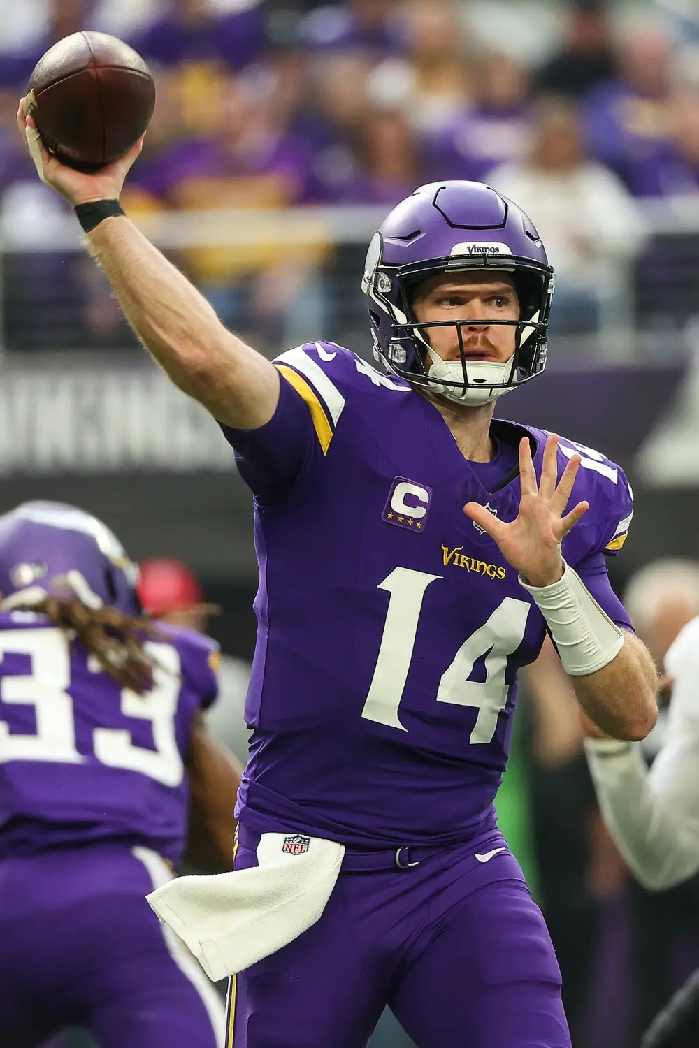 Dec 8, 2024; Minneapolis, Minnesota, USA; Minnesota Vikings quarterback Sam Darnold (14) throws the ball against the Atlanta Falcons during the first quarter at U.S. Bank Stadium. Mandatory Credit: Matt Krohn-Imagn Images