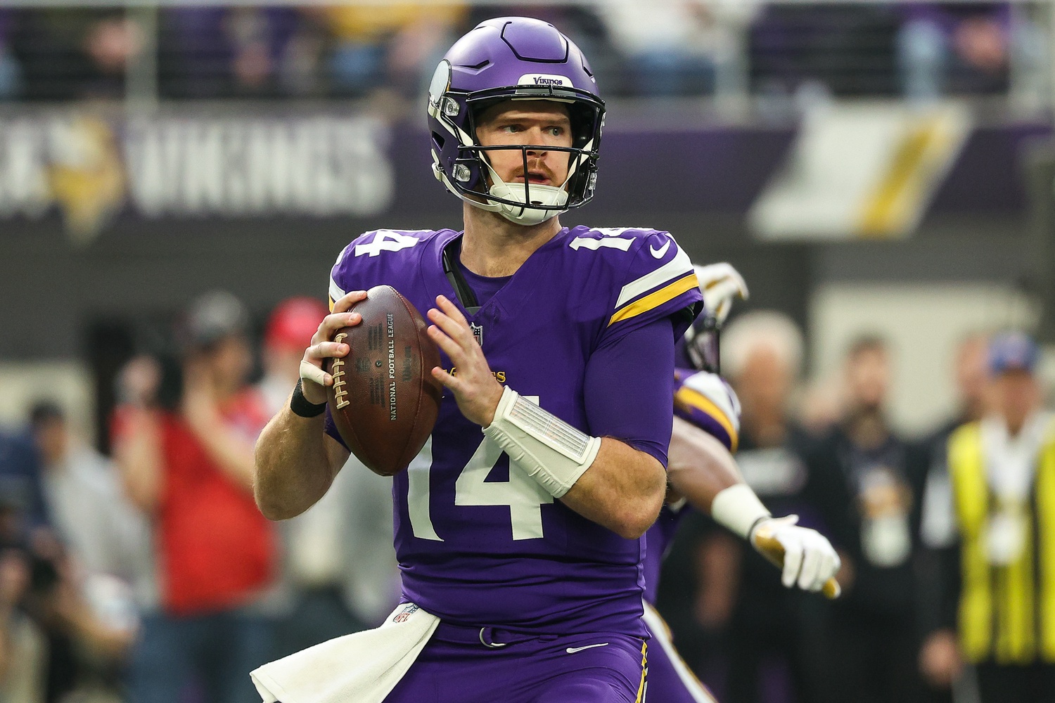 Dec 8, 2024; Minneapolis, Minnesota, USA; Minnesota Vikings quarterback Sam Darnold (14) throws the ball against the Atlanta Falcons during the first quarter at U.S. Bank Stadium. Mandatory Credit: Matt Krohn-Imagn Images