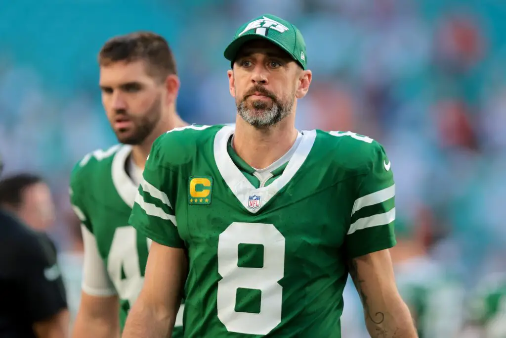 Dec 8, 2024; Miami Gardens, Florida, USA; New York Jets quarterback Aaron Rodgers (8) looks on after the game against the Miami Dolphins at Hard Rock Stadium. Mandatory Credit: Sam Navarro-Imagn Images