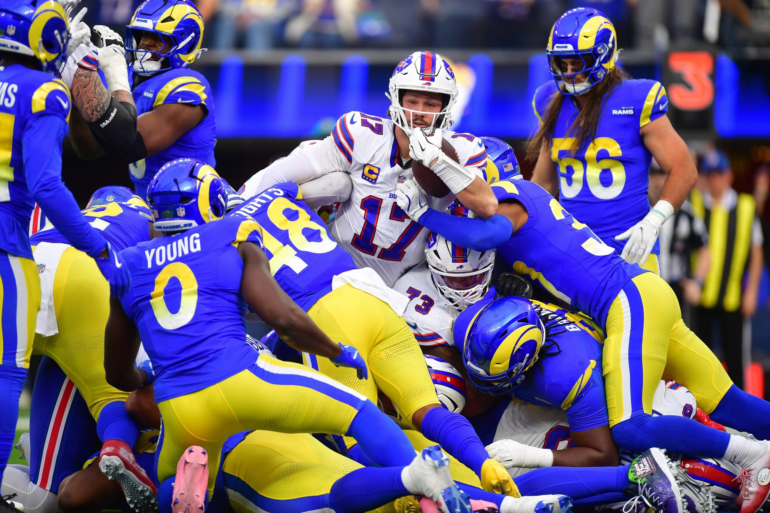 Dec 8, 2024; Inglewood, California, USA; Buffalo Bills quarterback Josh Allen (17) scores a touchdown against the against the Los Angeles Rams during the first half at SoFi Stadium. Mandatory Credit: Gary A. Vasquez-Imagn Images