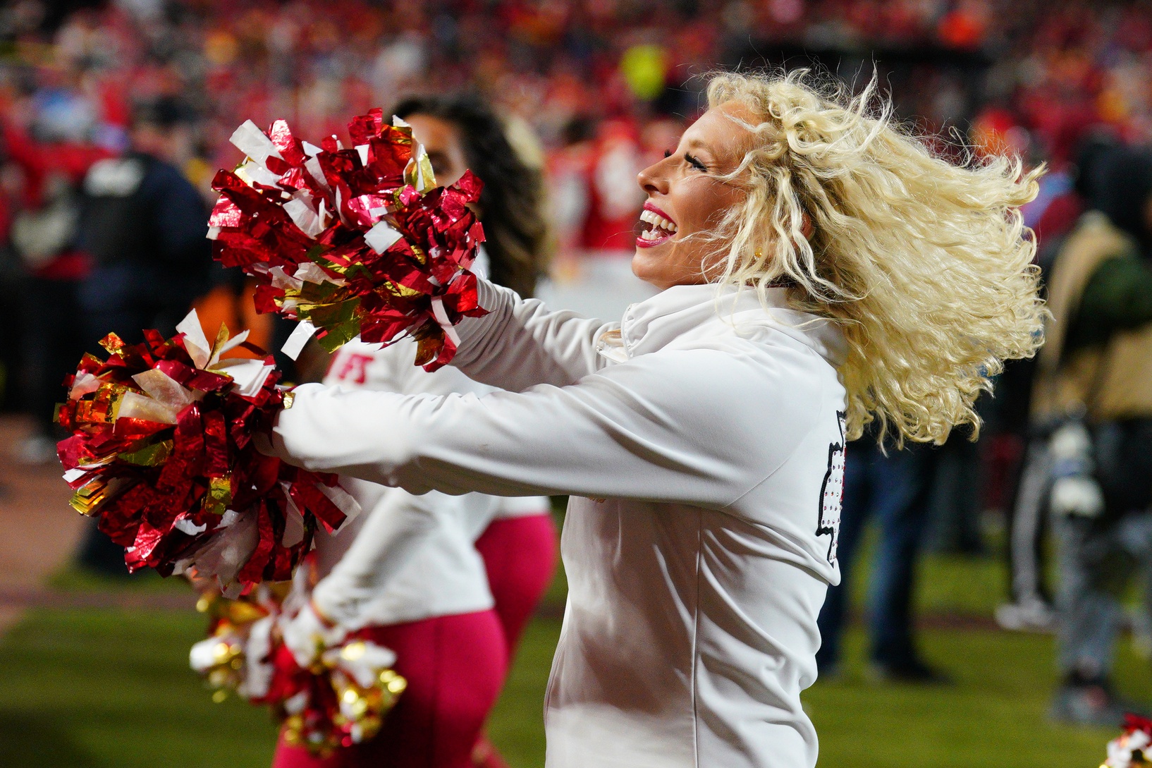 Dec 8, 2024; Kansas City, Missouri, USA; A Kansas City Chiefs cheerleader performs against the Los Angeles Chargers during the first half at GEHA Field at Arrowhead Stadium. Mandatory Credit: Denny Medley-Imagn Images