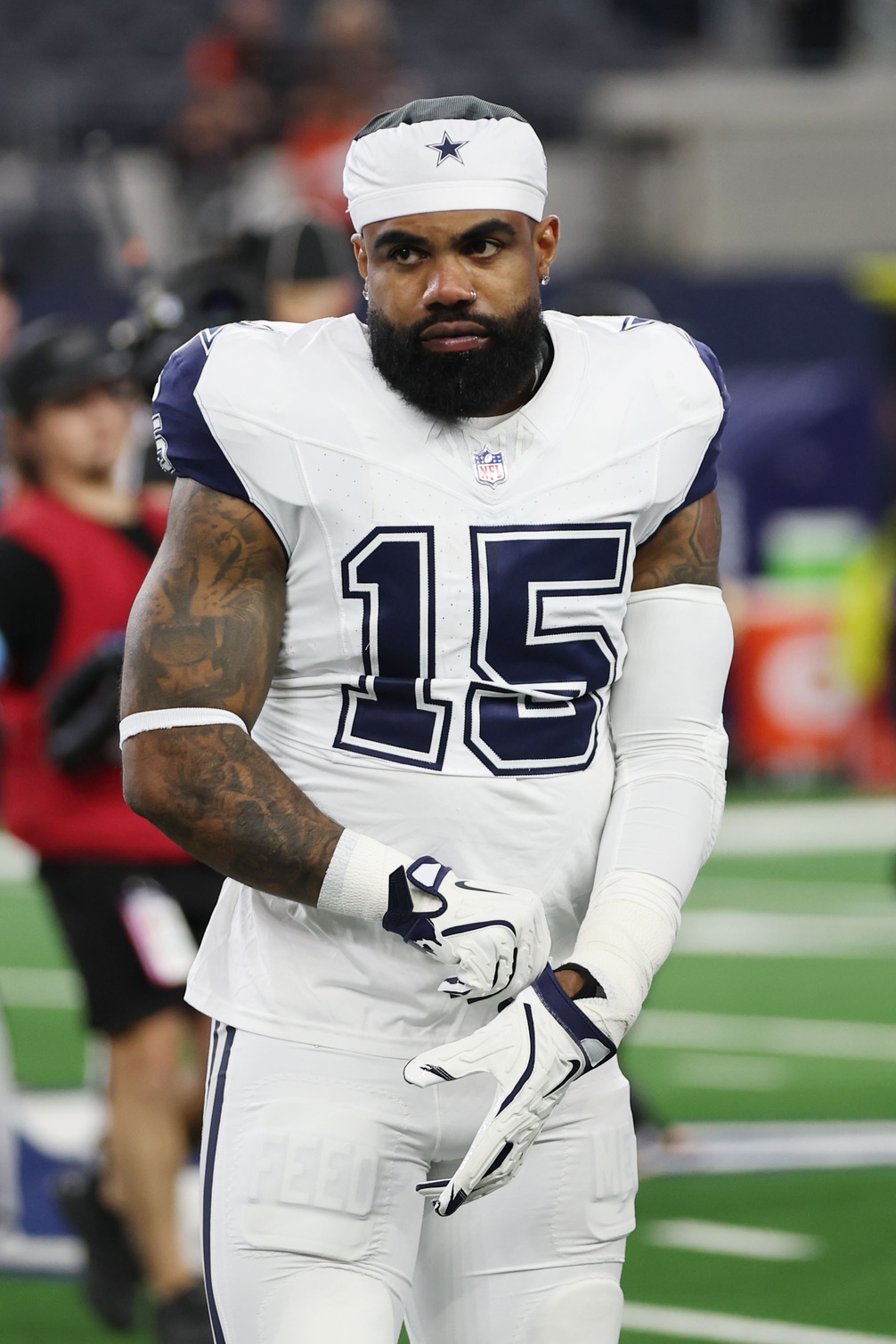 Dec 9, 2024; Arlington, Texas, USA; Dallas Cowboys running back Ezekiel Elliott (15) stands on the field before a game against the Cincinnati Bengals at AT&T Stadium. Mandatory Credit: Tim Heitman-Imagn Images